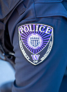 A UWPD officer uniform showing the UWPD patch on the officer's left arm.